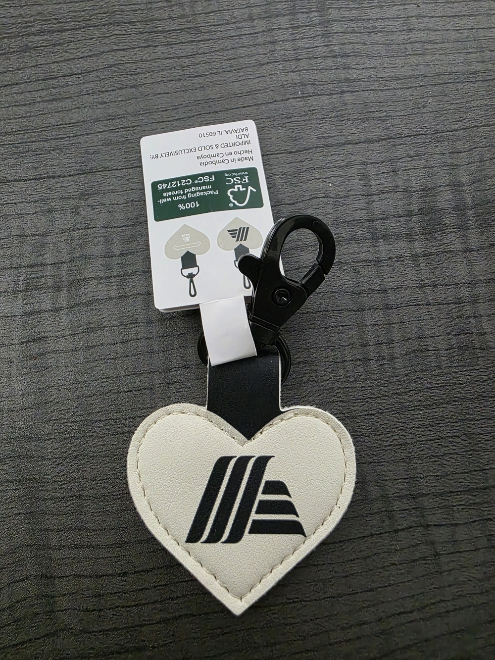 Aldi White Heart Quarter Holder Keychain with Black Logo and Clip